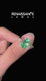 Silver Oval Cut Green Sapphire Solitaire Engagement Ring with Classic Band and Four-Prong Setting