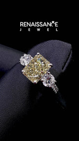 White gold Fancy Yellow Radiant  Cut Diamond Three-Stone Ring with Round Side Stones and Pavé Band