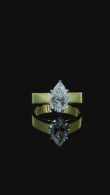 Yellow gold Pear Solitaire Engagement Ring with Six-Prong Setting and Tapered Band