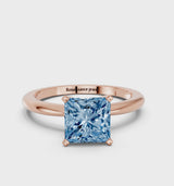 Rose gold Fancy Blue Princess Cut Diamond Solitaire Ring with Six-Prong Setting and Classic Band