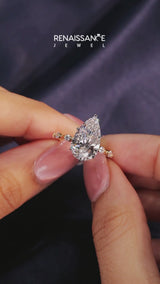 Yellow gold Pear Solitaire Diamond Ring with Bezel Set Side Stones and Prong Setting