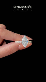 Yellow gold Marquise Cut Diamond Side Stone Solitaire Ring with Round  and Four-Prong Setting