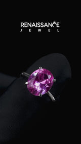 Silver Oval Cut Pink Sapphire Solitaire Engagement Ring with Classic Band and Four-Prong Setting