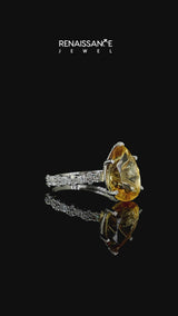 Silver Pear Cut Citrine Side Stone Solitaire Ring with Round and Four-Prong Setting