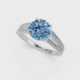 White gold Fancy Blue Round Cut Diamond Solitaire Engagement Ring with Split Shank Pavé Band