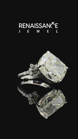 Platinum Cushion Cut Diamond Ring with Side Stones and Four-Prong Setting