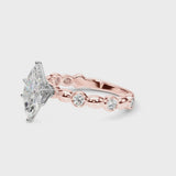 Rose gold Marquise Solitaire Bezel-Set Diamond Ring with Beaded Band and Four-Prong Setting