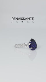 Silver Pear Cut Blue Sapphire Side Stone Solitaire Ring with Round  and Four-Prong Setting