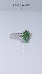 Silver Fancy Green Oval Cut Diamond Side Stone Solitaire Ring with Round  and Four-Prong Setting